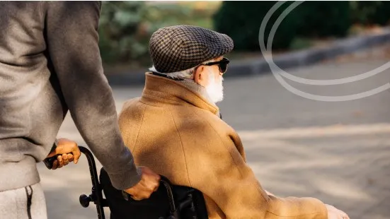 Man on wheelchair at a Senior care facility